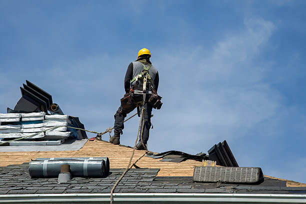 Professional Roof Replacement technician working in Brookfield, MA
